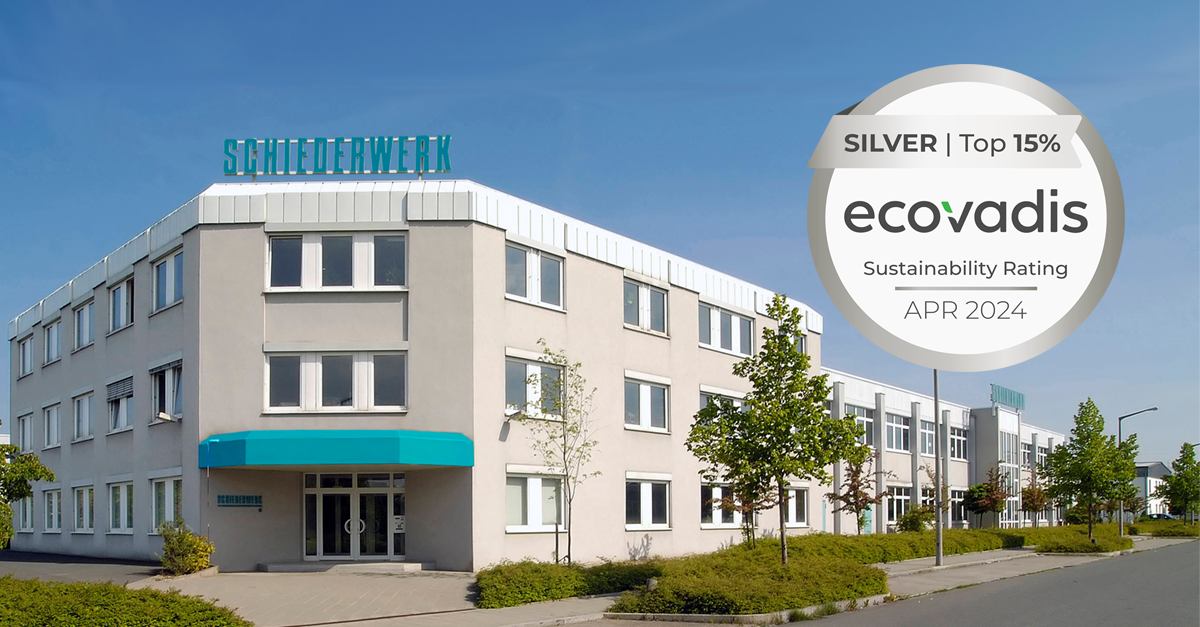 EcoVadis silver medal with the headquarter of Schiederwerk GmbH in the background.